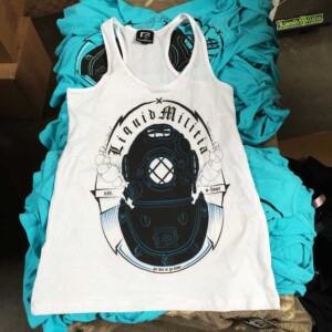Big 2 color front print. Liquid Militia Girls Racer back tanks